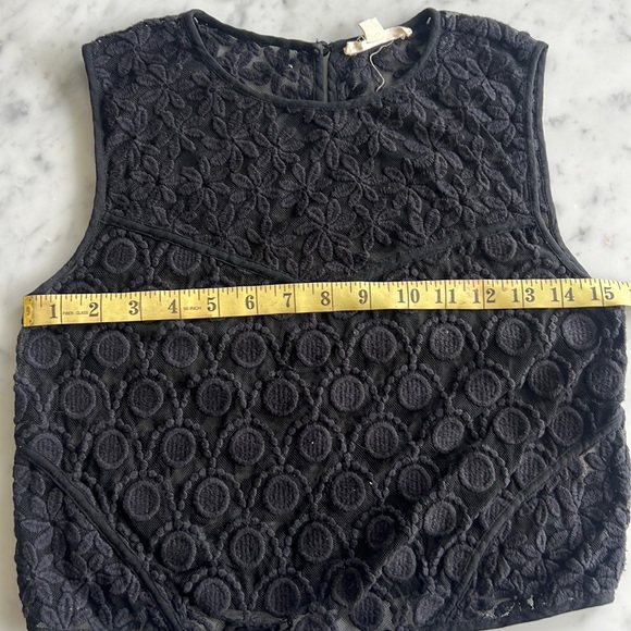 Lace sleeveless top. Wear over a turtleneck or solo. Flirty and playful. - Picture 3 of 6